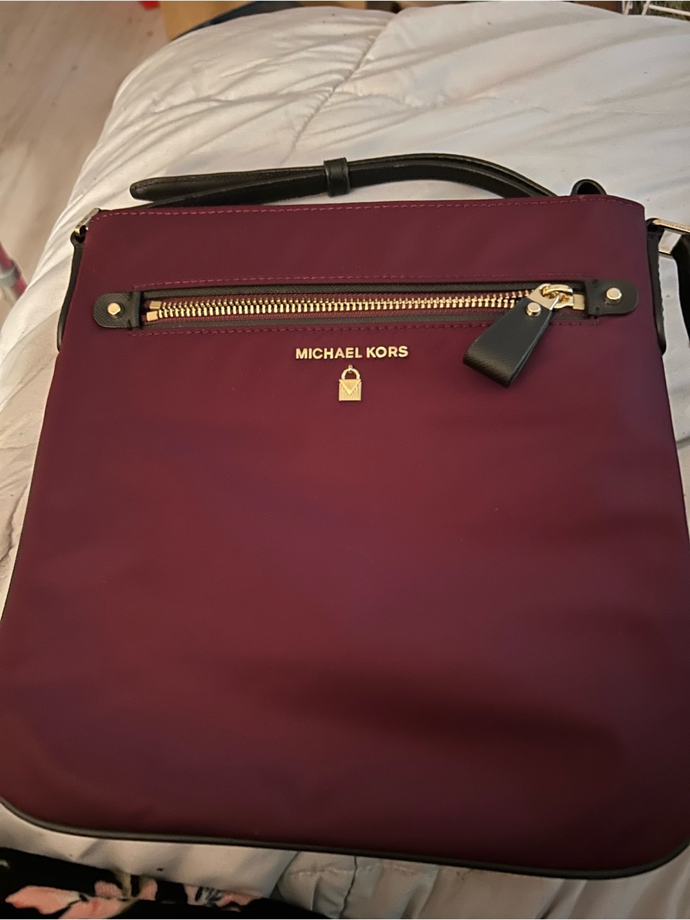 Michael Kors Plum Crossbody with Black Strap and Gold Hardware